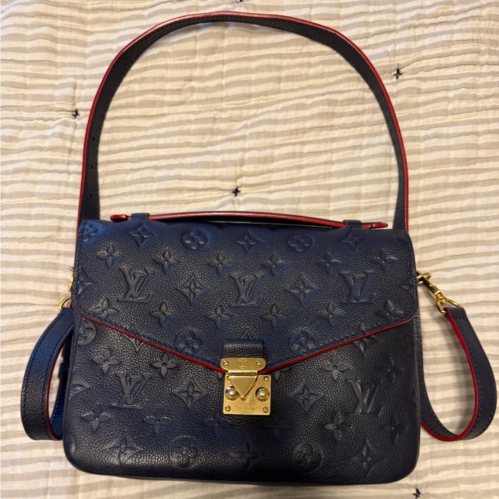 Louis Vuitton Pochette Métis Empreinte leather Navy